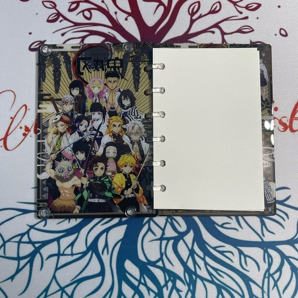 Anime-Themed A7 Shaker Notebook with Black and Gold Cover - Picture 3 of 4